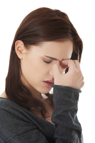 Female Holding Nose Sinus Pressue 2