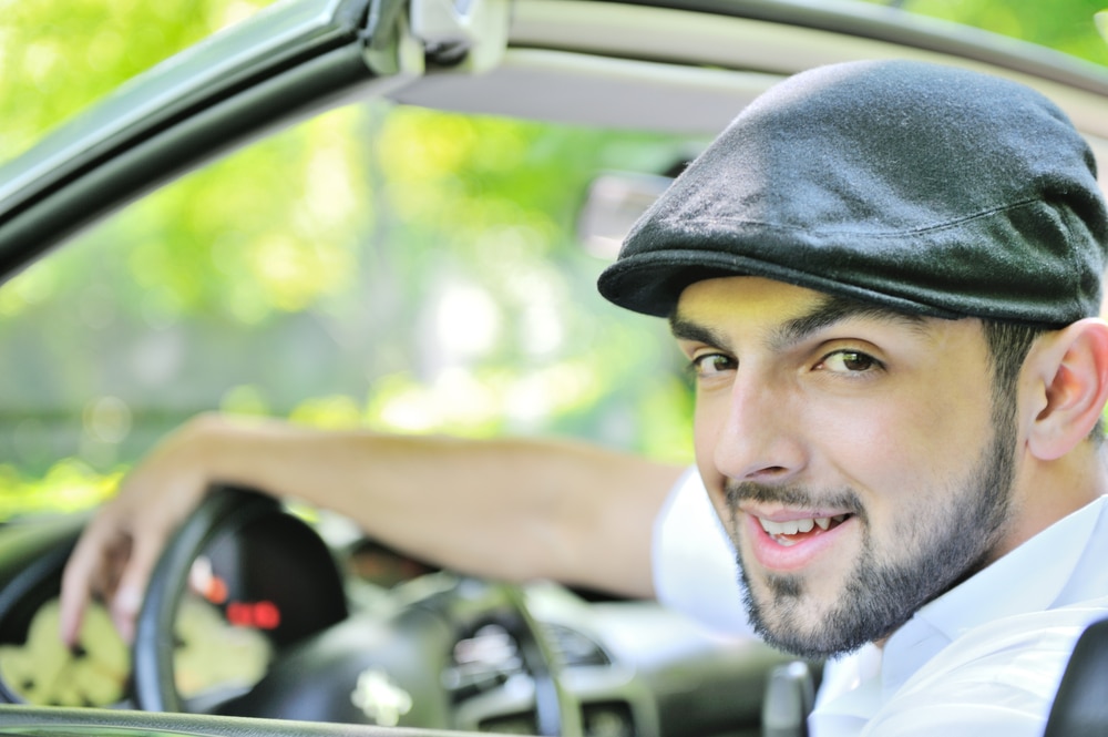 Young man on road trip with sinusitis in St, Louis, MO.